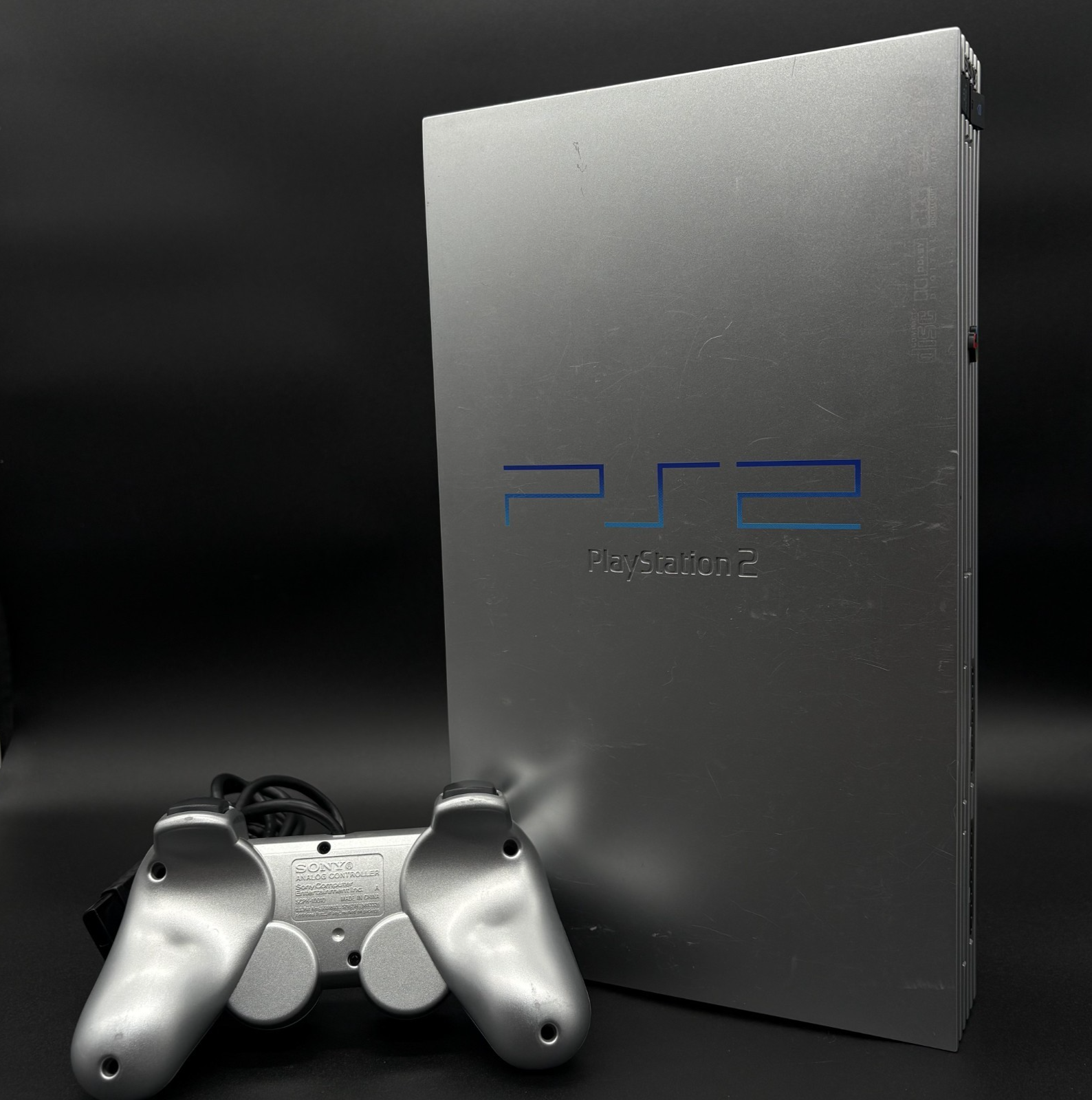 PlayStation 2 FAT Konsole mit Controller Rückseite