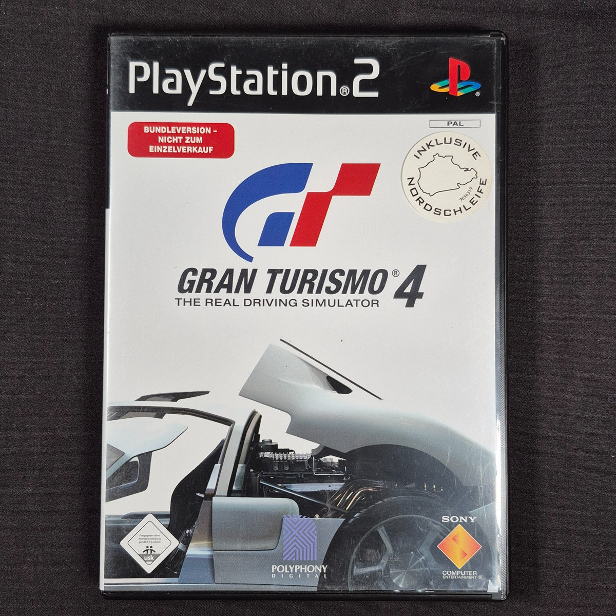Gran Turismo 4 – Sony PlayStation 2 – Deutsch – Zustand Gut – Vorderseite – NEVO Store
