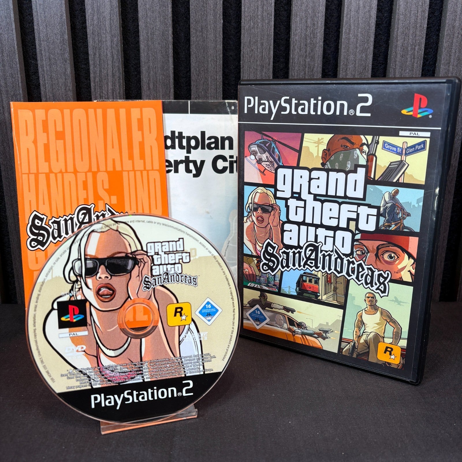 GTA San Andreas für PS2 Frontansicht mit Hülle, Anleitung und Karte