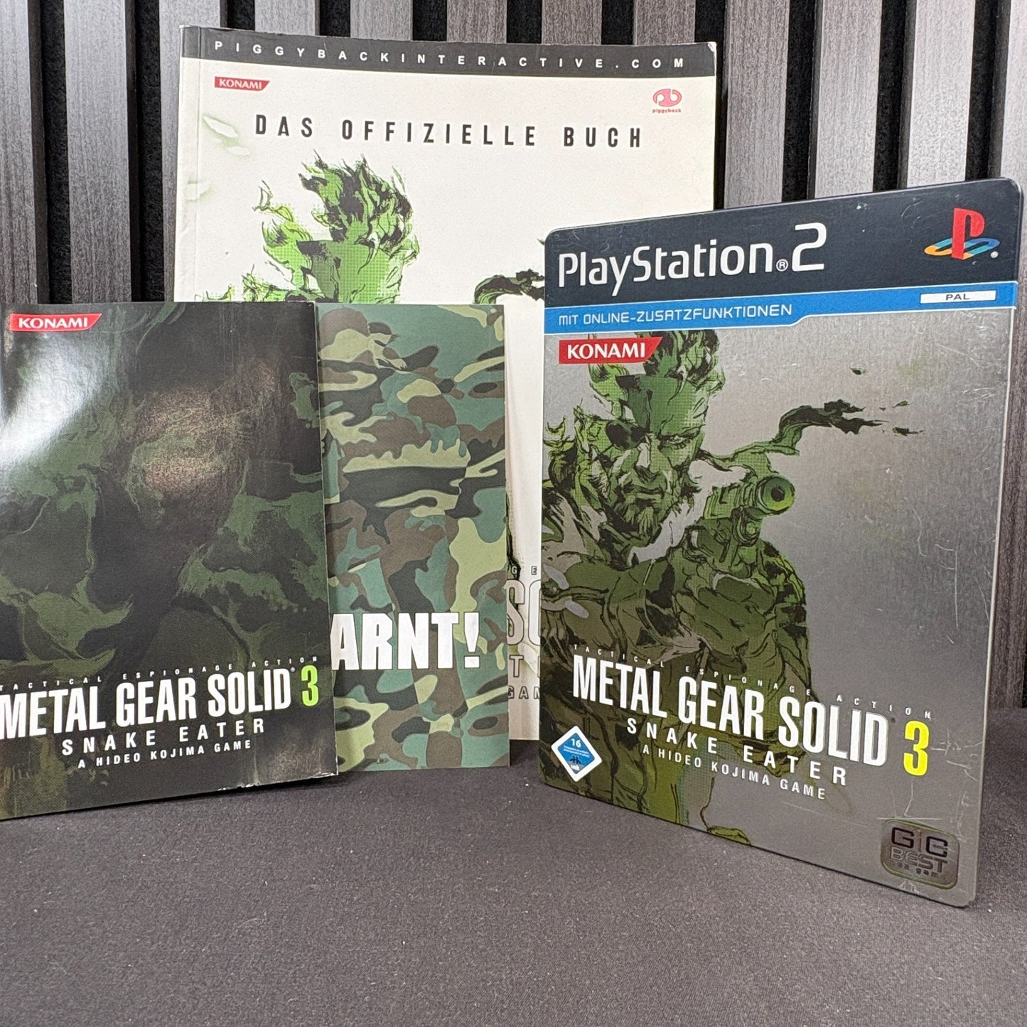 Metal Gear Solid 3 Snake Eater PS2 PAL CIB mit Lösungsbuch Vorderseite