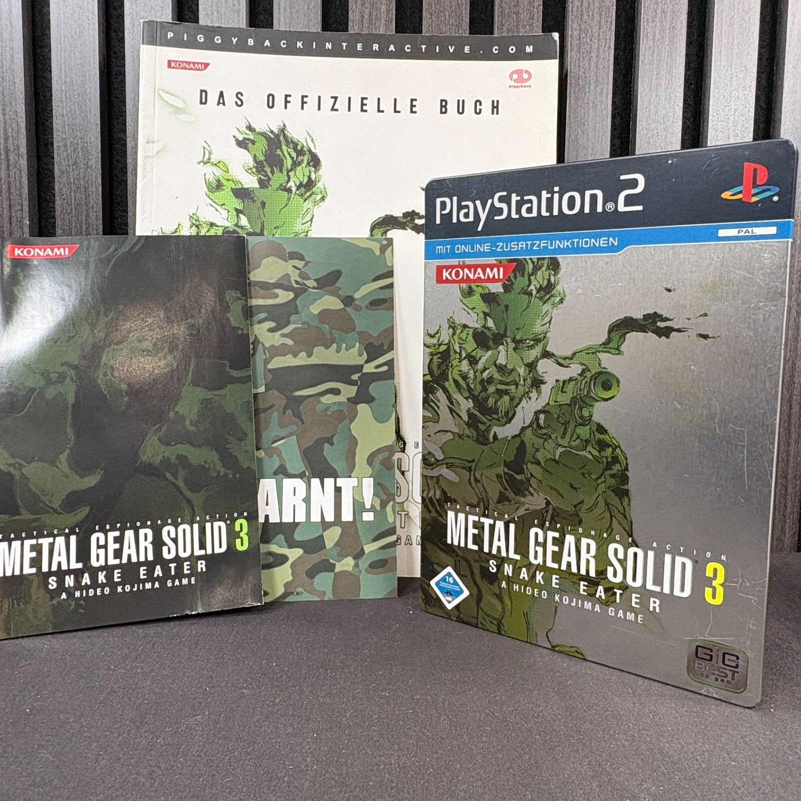 Metal Gear Solid 3 Snake Eater PS2 PAL CIB mit Lösungsbuch Vorderseite