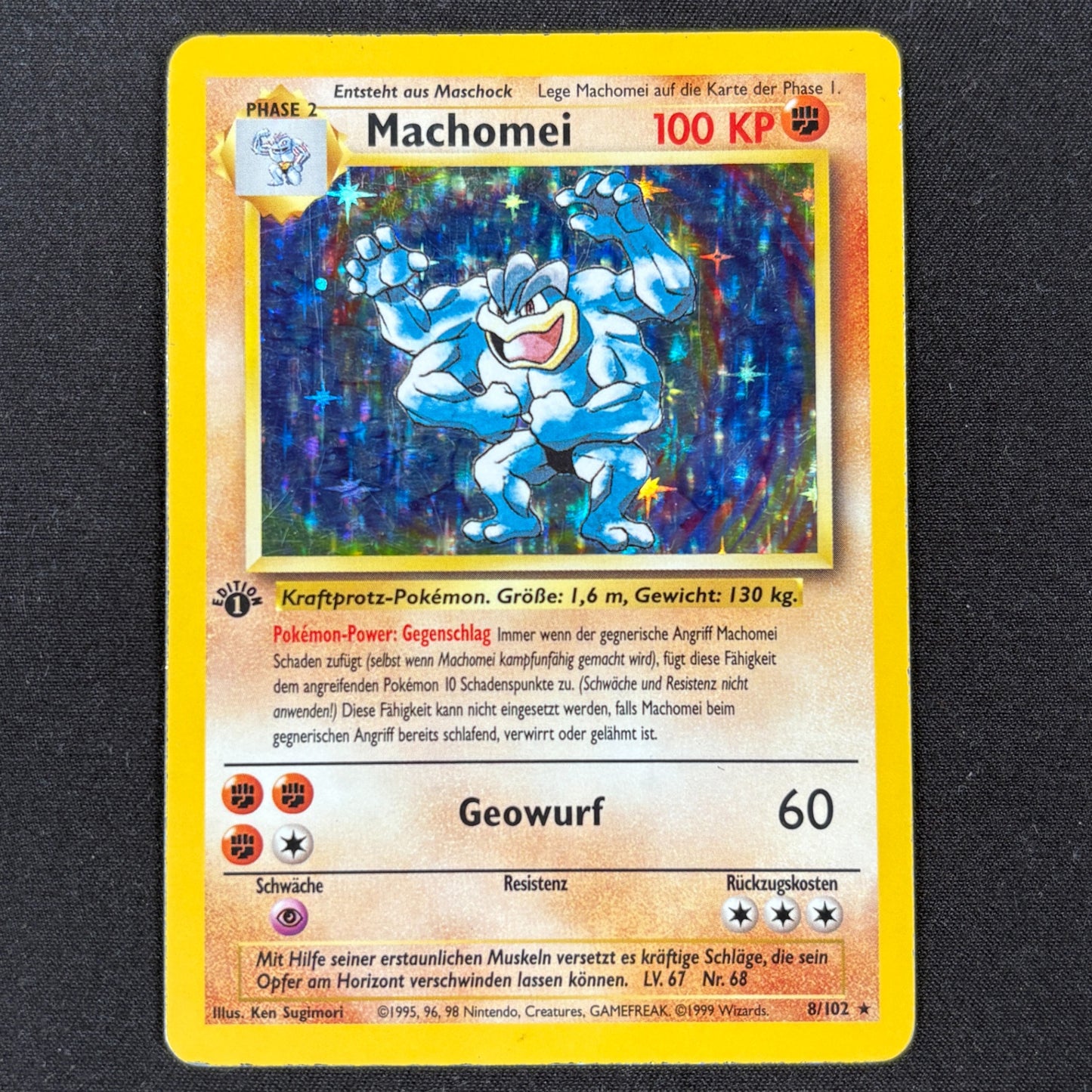 Pokémon Machomei 8/102 Holo Basis Set 1. Edition Deutsch Vorderseite