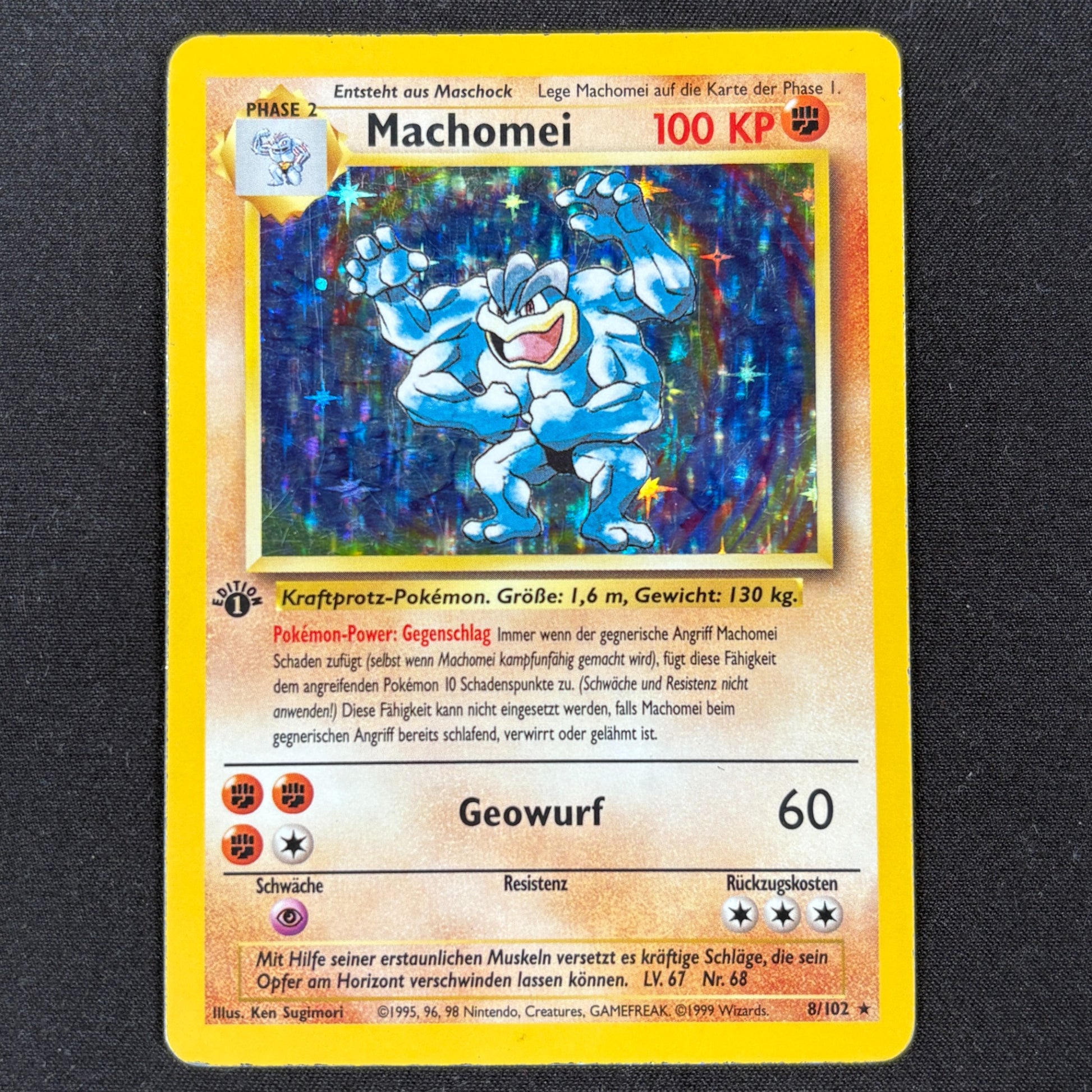 Pokémon Machomei 8/102 Holo Basis Set 1. Edition Deutsch Vorderseite