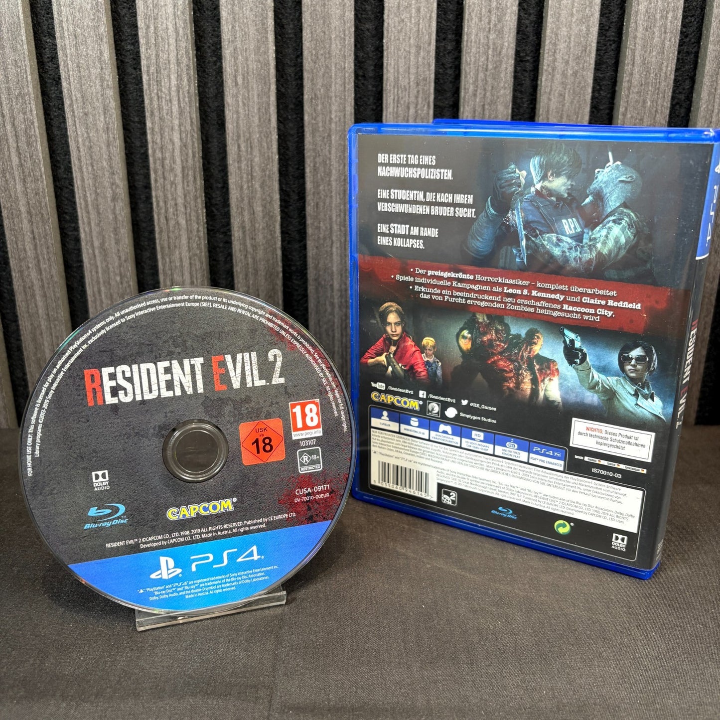 Resident Evil 2 PS4 geöffnete Hülle mit Disc