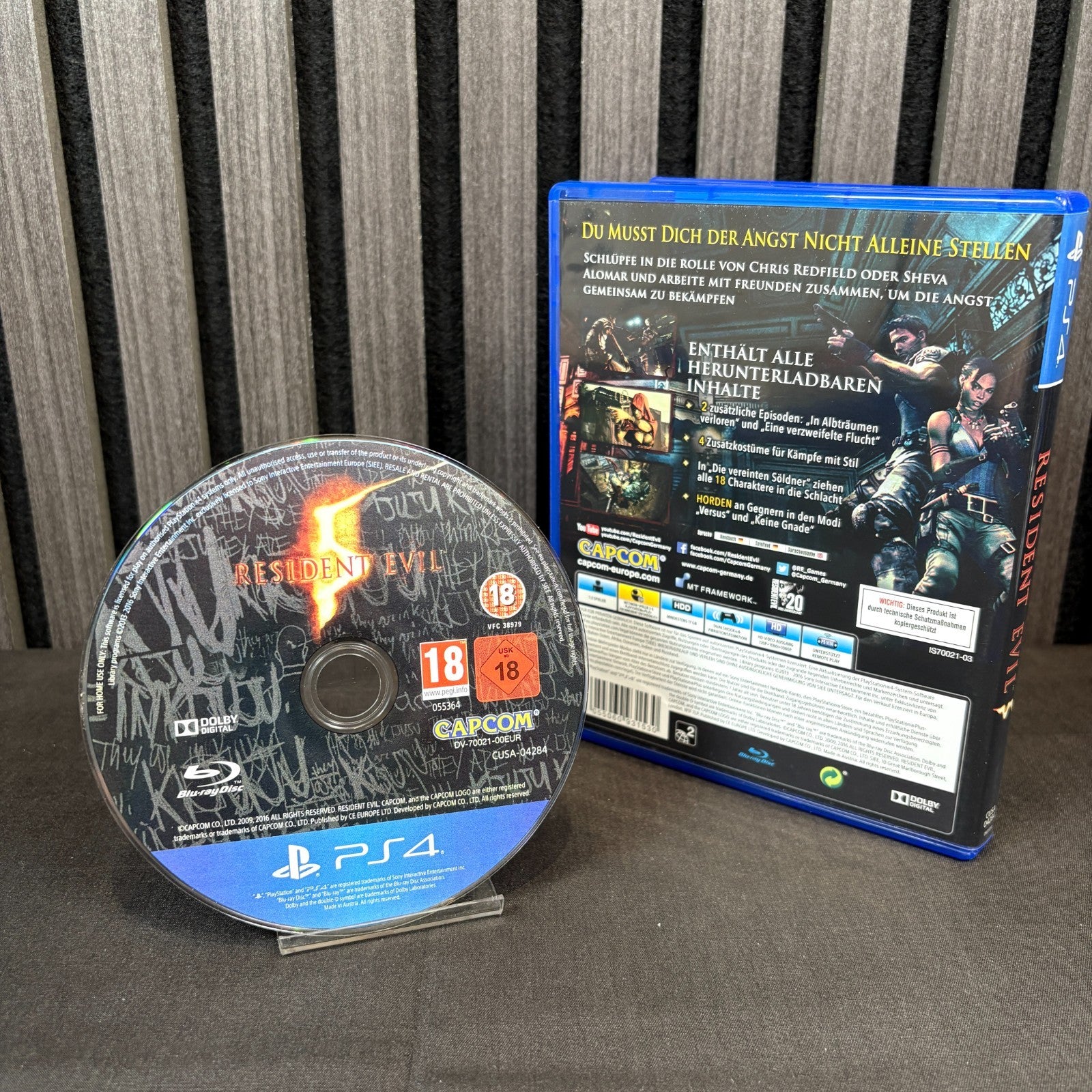 Resident Evil 5 PS4 PAL Spiel Rückseite mit Beschreibung
