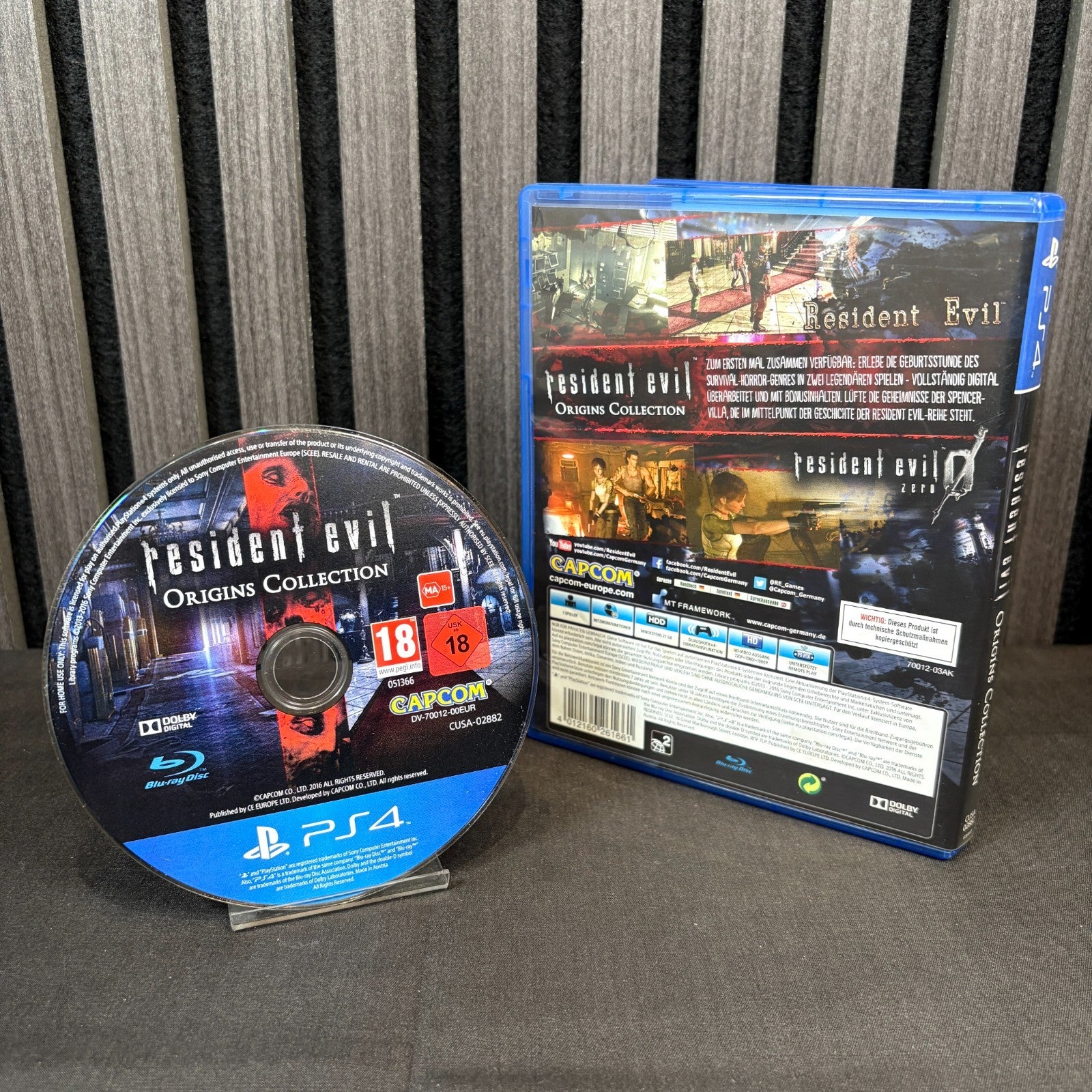 Resident Evil Origins Collection PS4 PAL Spiel Rückseite mit Beschreibung